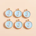 Detail of light blue enamel pendants with gold letter J for DIY jewelry making - Letter J