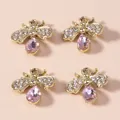 Exquisite gold bee charms with pink pear-shaped gemstones and white crystal wings - Pink