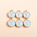 Close-up of circular light blue enamel charms with gold trim and golden letter Y - Letter Y