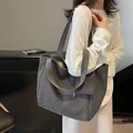 Grey houndstooth woven tote bag with wide shoulder strap and silver square pendant - 46*15*29 / Black
