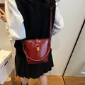 Chic burgundy bucket bag with gold buckle and slim strap, perfect for women's daily commute - 21*10*18 / Burgundy