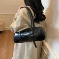 Classic black baguette shoulder bag in glossy faux leather with decorative double buckle straps - 37*10*13 / Black