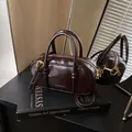 Retro dark brown patent leather boston bag with top handles and adjustable strap - No Pendant / Brown