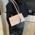 Chic beige glossy leather large underarm bag with decorative woven pendant - With Charm / Pink