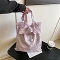 Lavender floral tote bag featuring ruffle edges and Magic Pocket tag in pastoral style - Purple