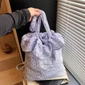 Light purple floral chiffon tote bag with ruffle lace detail and Magic Pocket label - Blue