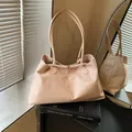 Glossy light pink faux leather tote bag with silver buckle and slim shoulder straps - Without Pendant / Pink