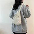 Minimalist off-white crossbody chest bag with adjustable strap and fashion logo - Off White