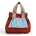 Mini color-block drawstring handbag in dark red with blue pocket and khaki handles - Orange
