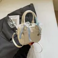 Chic off-white bowling bag with lace ribbons and heart pendant for women - With Pendant / Off White