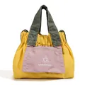 Mini borsa a tracolla in nylon giallo e viola con coulisse e design moderno patchwork - Giallo