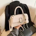 Chic beige square handbag with silver buckle and decorative bell charm on a suit - 22x8x13cm / White With Pendant