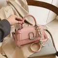 Minimalist light pink square handbag with silver U-shaped buckle and stylish long key charm - 22x8x13cm / Pink With Pendant