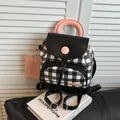Mini mochila de cuadros blancos y negros con detalles rosas y tarjetero a juego - 19*9*21 / Negro