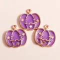 Three purple enamel pumpkin charms with gold stars for Halloween DIY jewelry making - Purple