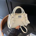 Chic beige crossbody handbag with silver lock and mini coin purse accessory - White