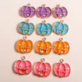 Colorful enamel Halloween pumpkin charms with golden stars and hooks for DIY jewelry - Multicolor