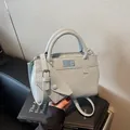 Minimalist light blue faux leather satchel bag with detachable triangle coin pouch - Blue
