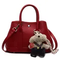 Red lychee pattern bucket bag with detachable strap and cute teddy bear charm - Wine Red With Little Bear Pendant