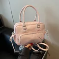 Borsa rosa in pelle con fiocco e doppia tracolla e dettagli metallici a farfalla - Rosa