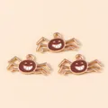Three pieces of golden alloy spider charms with brown enamel and a cute face for DIY jewelry - Brown