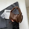 Dark brown lychee texture dumpling bag with stylish scrunchie handle and silver buckles - No Pendant / Coffee