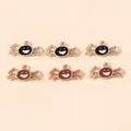 Detailed view of DIY spider charms with golden alloy plating and colorful enamel finish - Multicolor