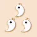 Three white enamel Tai Chi comma pendants with gold trim for DIY jewelry making - Gold White