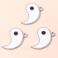 Detail of three white enamel Tai Chi fish charms with metal rings for DIY jewelry making - Silver