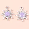 Macro view of purple enamel sunflower pendants with sparkling rhinestones and silver base - Silver Purple