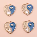 Detailed view of heart-shaped Yin Yang charms with gold alloy and blue enamel for DIY jewelry - Dark Blue