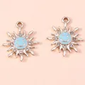 Detail of sun flower smile pendants with light blue enamel and sparkling rhinestones - Gold Blue
