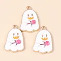 Detail view of cute Halloween ghost charms with enamel finish and gold alloy trim - White