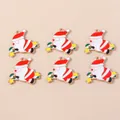 Detailed macro view of 6 enamel Santa Claus alloy pendants for DIY jewelry making - Red