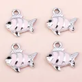 Detail of four silver-toned metal fish pendants with pink enamel stripes for DIY jewelry making - 10 Pieces/Pack / Silver Pink