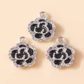 Macro detail of enamel camellia flower charms with silver frame and sparkling crystals - Silver Black