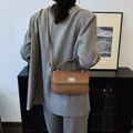 Brown leather crossbody square bag with pebble grain texture and metal twist lock - 23*6*14 / Brown