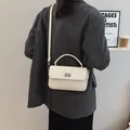 Chic cream white leather crossbody bag for women with minimalist silver twist lock - 23*6*14 / Off-white