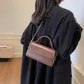 Vintage brown structured square handbag in smooth leather with gold text detail - Brown