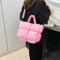 Pink quilted down tote bag with shoulder strap and glossy finish for women - Pink