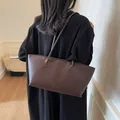 Bolso tote minimalista marrón oscuro con costura central y correas de hombro - 44*11*20 / café
