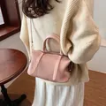 Modische hellrosa Plissee-Eimertasche für Damen mit vielseitigem Schultergurt - 23*11*12cm / Rosa