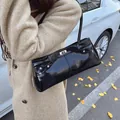 Glossy black patent leather shoulder bag with silver hardware and twist lock - 33cmx8cmx14cm / Black