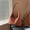 Caramel brown suede hobo tote bag for women featuring a minimalist aesthetic and retro style - Brown No Pendant