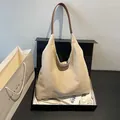 Minimalist beige suede hobo tote bag with brown leather handles in a black gift box - Beige No Pendant