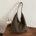 Minimalist dark brown suede hobo tote bag for women featuring a spacious soft design - Green Without Pendant