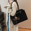Large black suede tote bag for women featuring a brown leather pouch and woven strap - Baseball Eyeglass Case Charm / Black