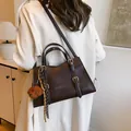 Dark brown leather tote bag with vintage straps and cute puppy charm for women - Standard Spec / Coffee With Pendant