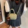 Pale green bowling bag with teddy bear charm and MAUDAI BEAR embossed crossbody design - With Bear Pendant / Green