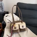 Vintage multi-pocket tote bag in brown and beige leather with gold heart pendant - Khaki With Rabbit Pendant